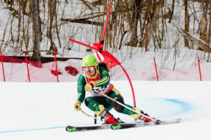 Clarkson student and alpine skiier Libby McCusker racing at Clarkson's home hill, Whiteface Mountain, in Lake Placid, New York, during her senior year.