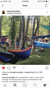 A image of an Instagram post with people hanging in air hammocks
