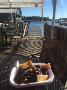Mussels and chicken overlooking the water at Coleman's Dock of the Bay.