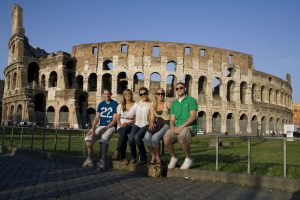 Five Clarkson students on a global business trip to Rome, Italy pose in front of the Colosseum.