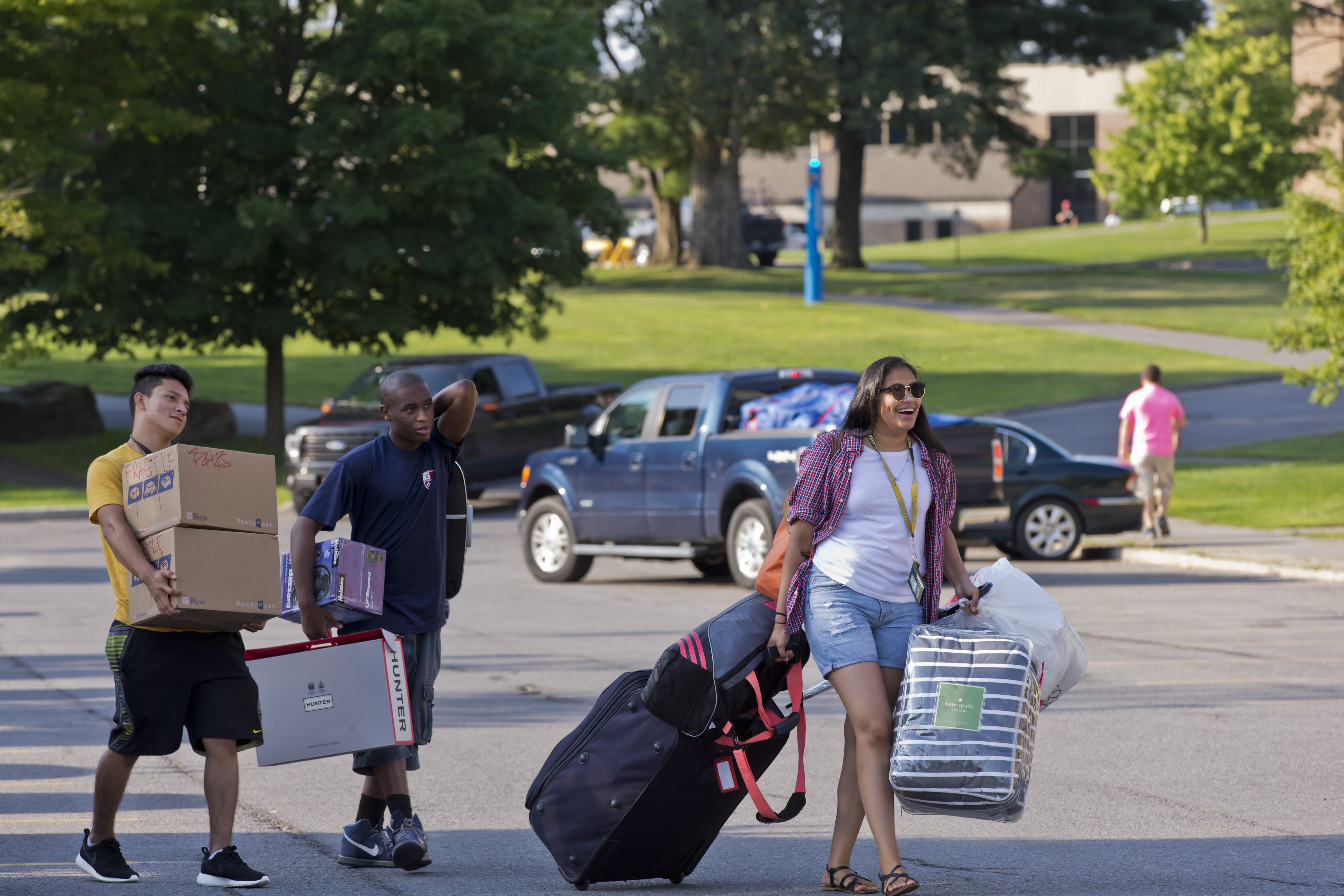 New Clarkson students move their personal items in to their residence halls during move in weekend