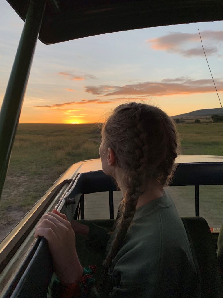 Callie Lindsay watching the sun rise over Masai Mara in Kenya