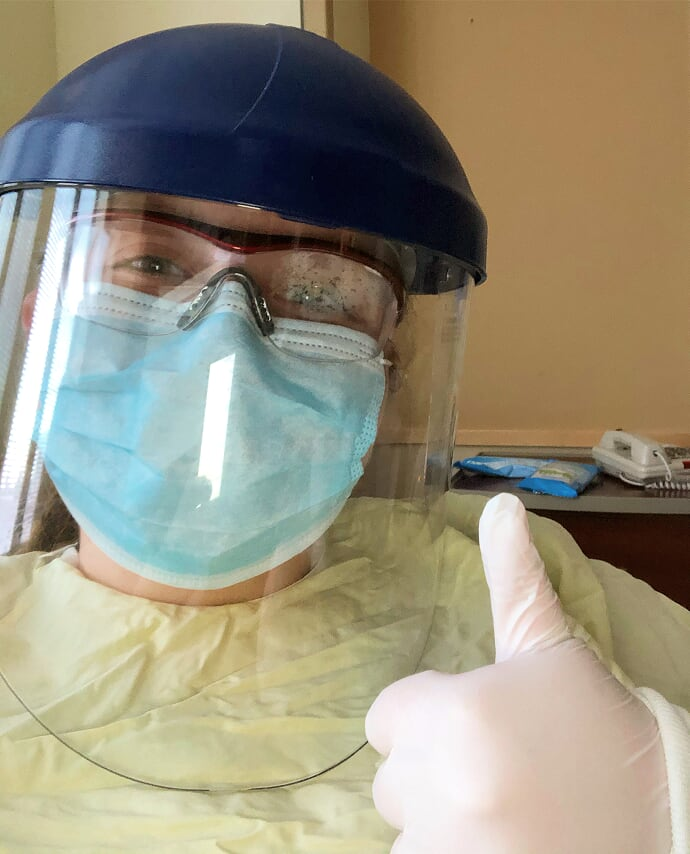 Megan wearing face protection and mask while working the front lines during the COVID-19 pandemic
