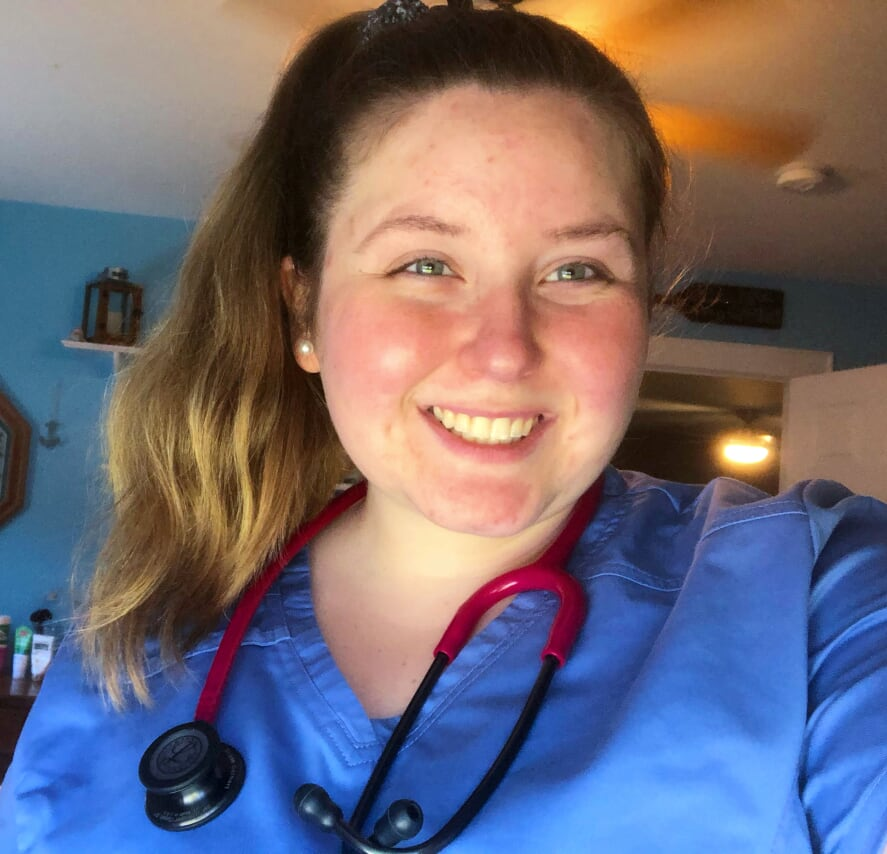 Megan Carhart in scrubs while working at the Albany Medical Center