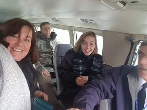 Jackie and her parents in the back of a Cessna plane on the way to Clarkson