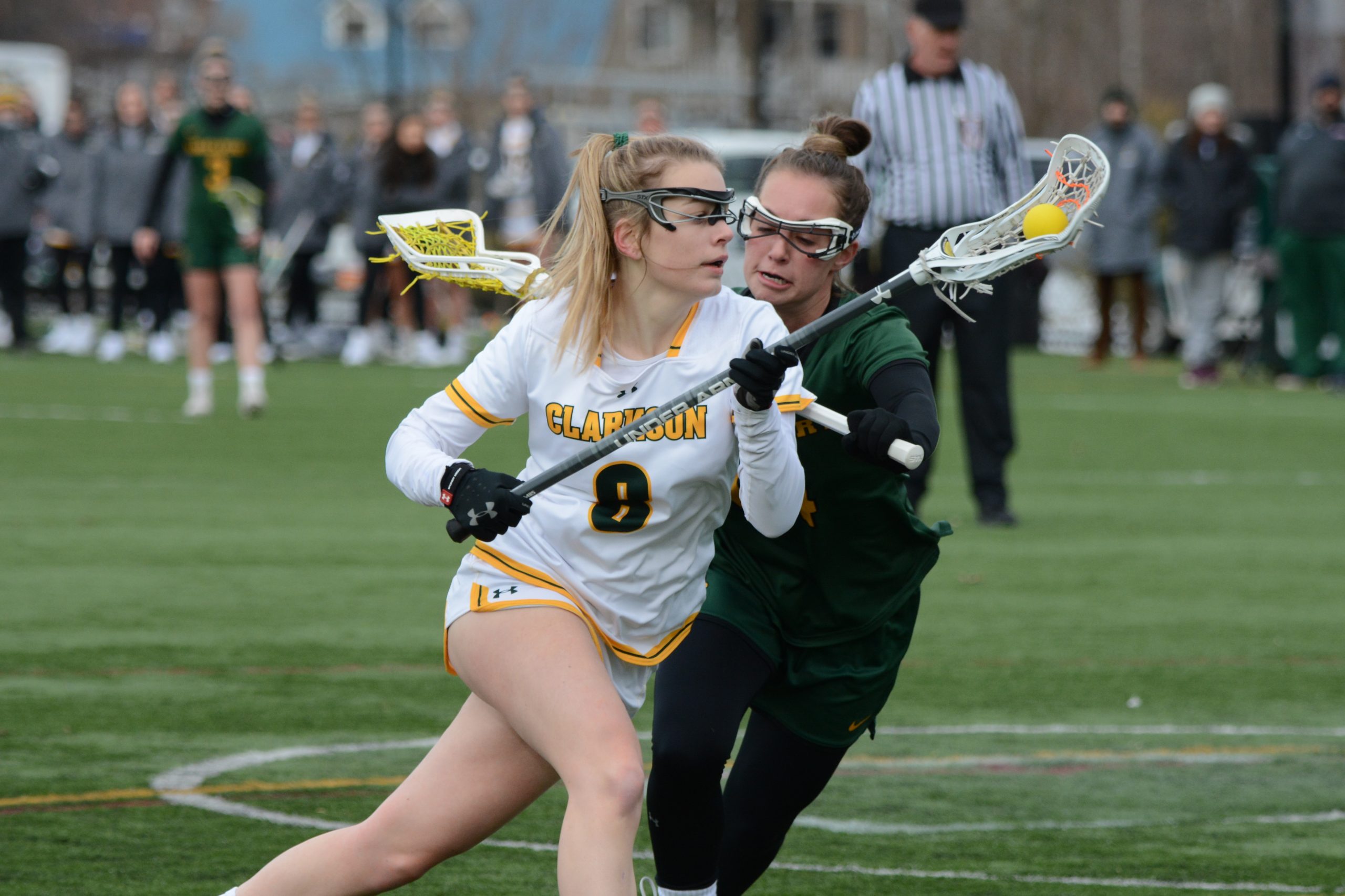 Clarkson student Julia Lavarnway in action against a defender while playing lacrosse on the women's Division III team