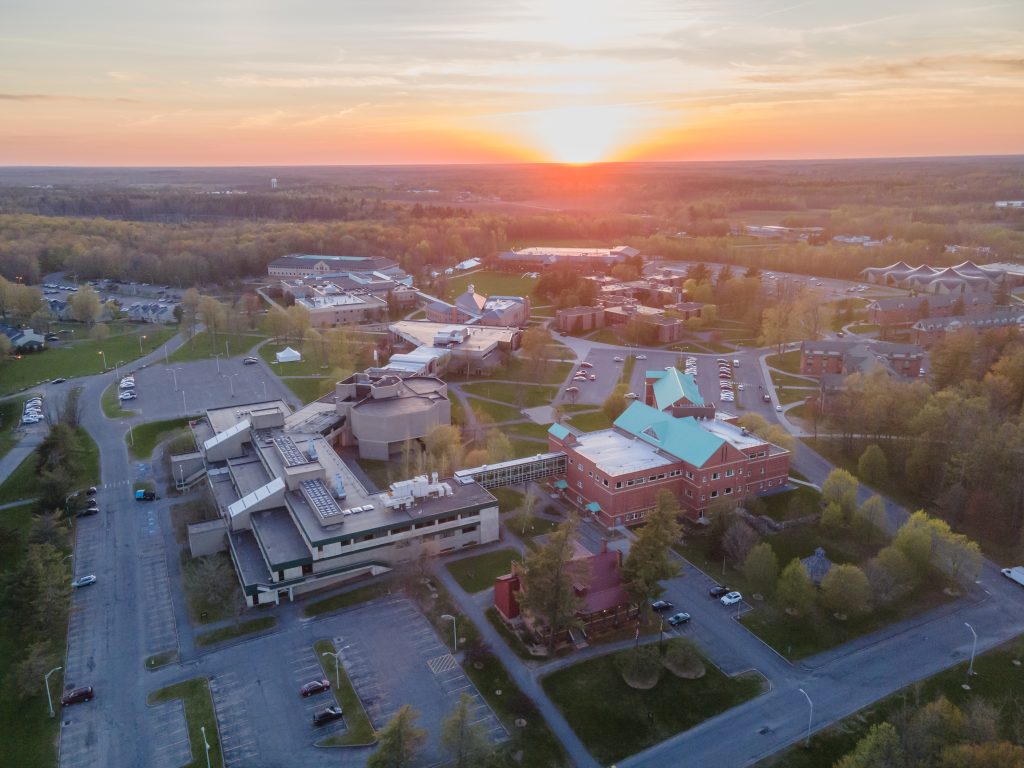 An aerial view of Clarkson University at sunrise.