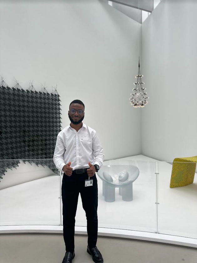 Clarkson University PhD Student Paul Akinyemi poses for a photo at Corning Incorporated during his internship experience.