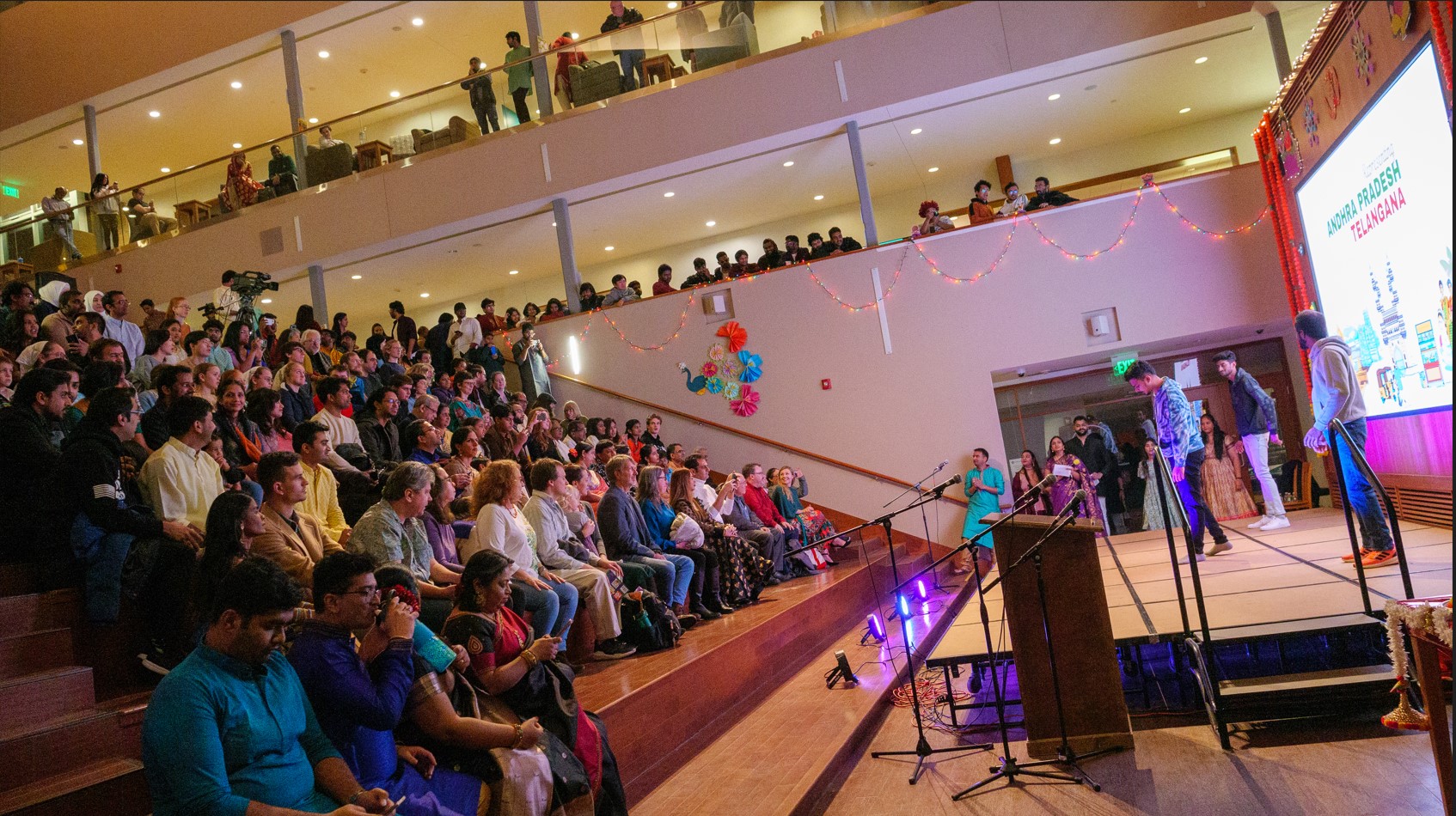 The Student Center Forum is full of faculty, staff, and students to celebrate Diwali on campus with food, dancing, and activities.