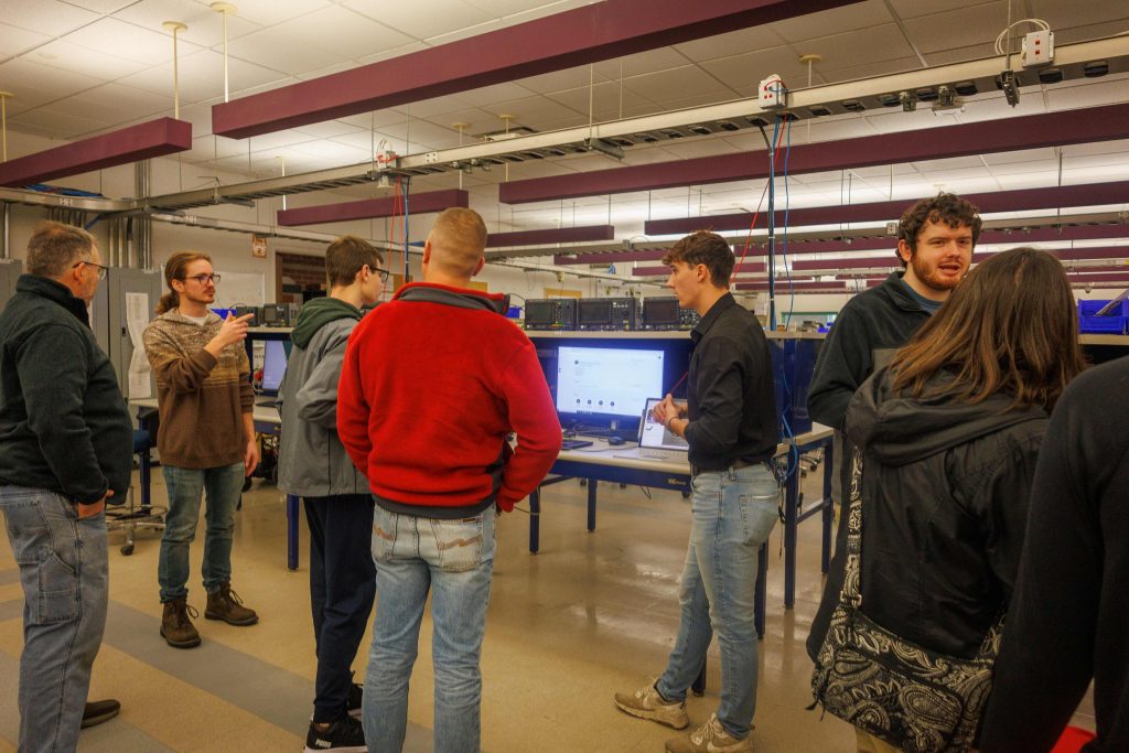 Matthew Griffith presenting a software engineering project during Clarkson University's Engineering Open House
