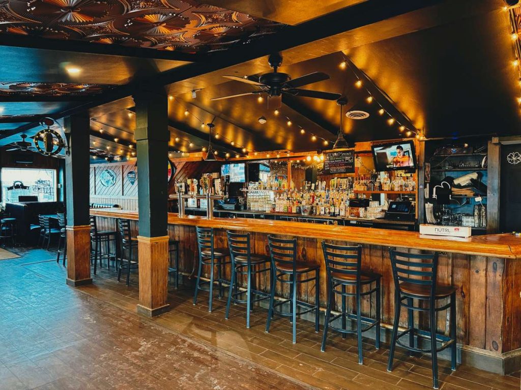 Inside of Mcduff's pub with a bar setting