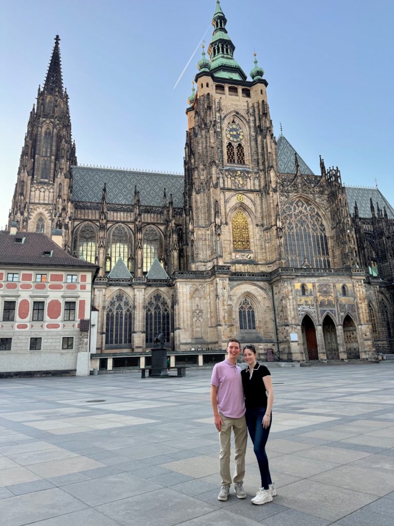 This is an image of two Clarkson students standing together in font of a building known for its architecture.